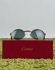 Cartier Eyewear Con montatura ovale e aste in legno