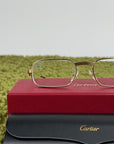 Occhiali Cartier Con aste oro e nere