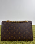 Borsa Louis Vuitton Victoire marrone rossa e oro
