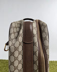 Valigia vintage Gucci realizzata in tela GG monogramma con dettagli in pelle marrone e strisce Web