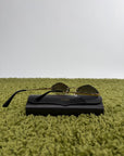 Occhiali da sole Panthère de Cartier CT0433S montatura Rimless e dettagli a testa di pantera sulle asse oro