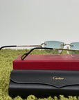 Occhiali da sole Cartier con aste oro