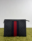 Pochette Gucci nera blu e rossa