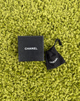 Orecchini Chanel in Resina Trasparente
