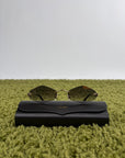 Occhiali da sole Panthère de Cartier CT0433S montatura Rimless e dettagli a testa di pantera sulle asse oro