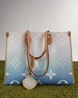 Borsa Louis Vuitton OnTheGo azzurra bianca e gialla