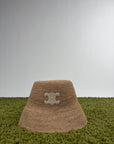 Cappello celine alla pescatora Triomphe in rafia beige