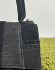 Borsa Balenciaga Hourglass Small in denim patchwork nero con logo B metallico argento