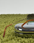 Occhiali da sole Rimless Cartier Eyewear Oro con lenti sfumate