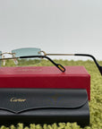 Occhiali da sole Cartier con aste oro