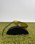 Occhiali da sole Prada Neri Con lente Gialla PR58YS