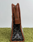 Pochette Goyard Jouvence in tela Goyardine nera con profili marroni