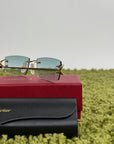 Occhiali da sole Cartier con aste oro