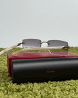 Occhiali Cartier CT0058O con aste in acetato effetto avorio