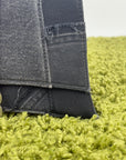 Borsa Balenciaga Hourglass Small in denim patchwork nero con logo B metallico argento
