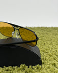 Occhiali da sole Prada Neri Con lente Gialla PR58YS