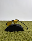 Occhiali da sole Prada Neri Con lente Gialla PR58YS