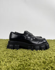 Mocassino Prada in pelle nera 9=43