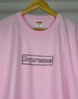 T-shirt supreme X kaws M rosa e nera