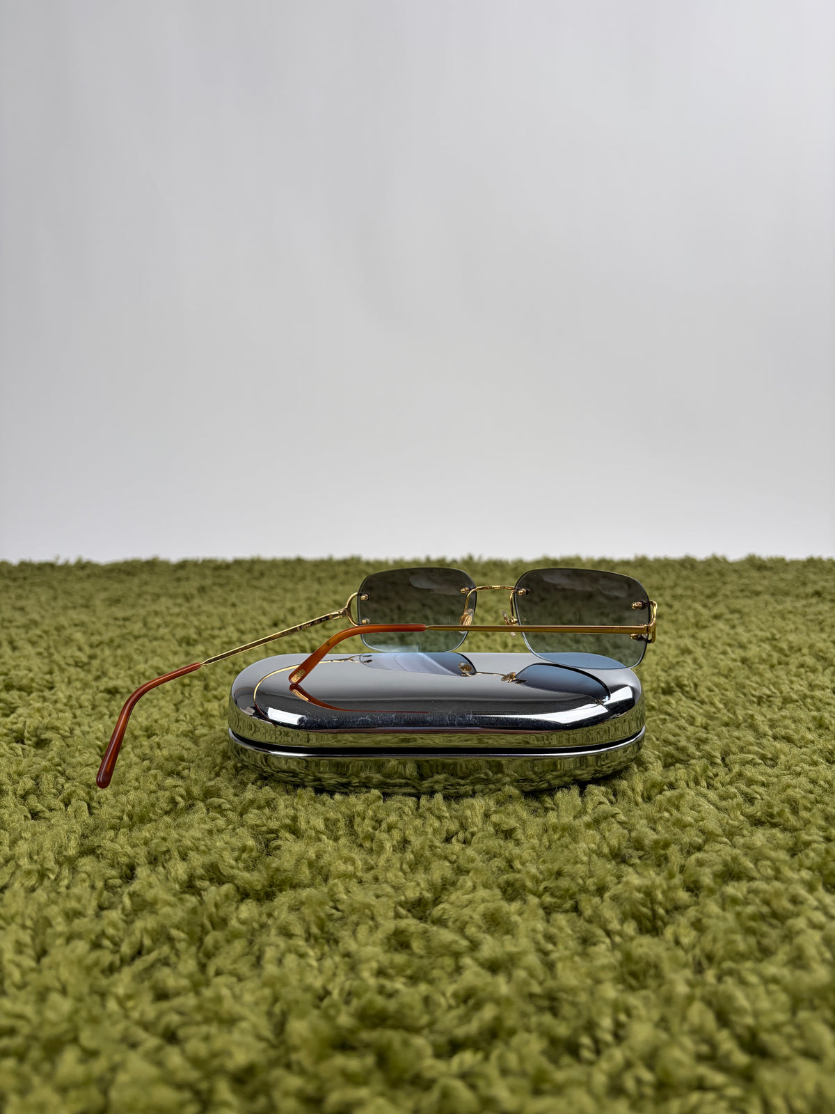 Occhiali da sole Rimless Cartier Eyewear Oro con lenti sfumate