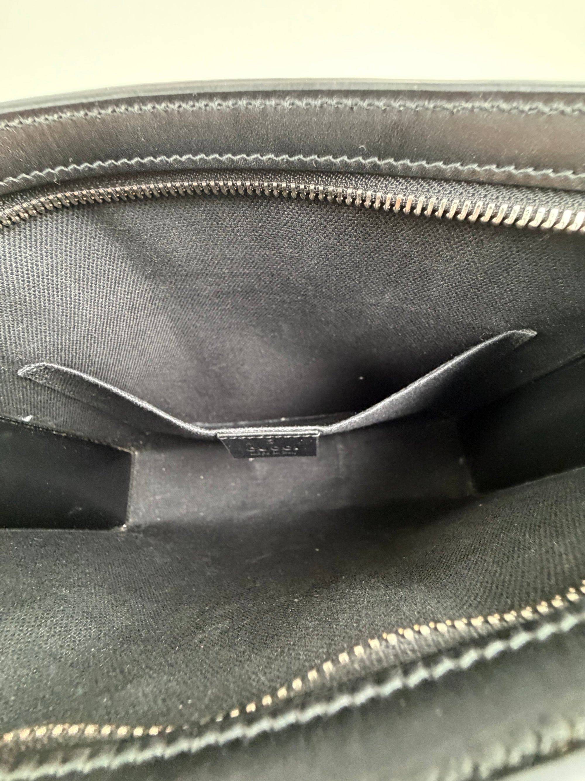 Pochette Gucci nera blu e rossa