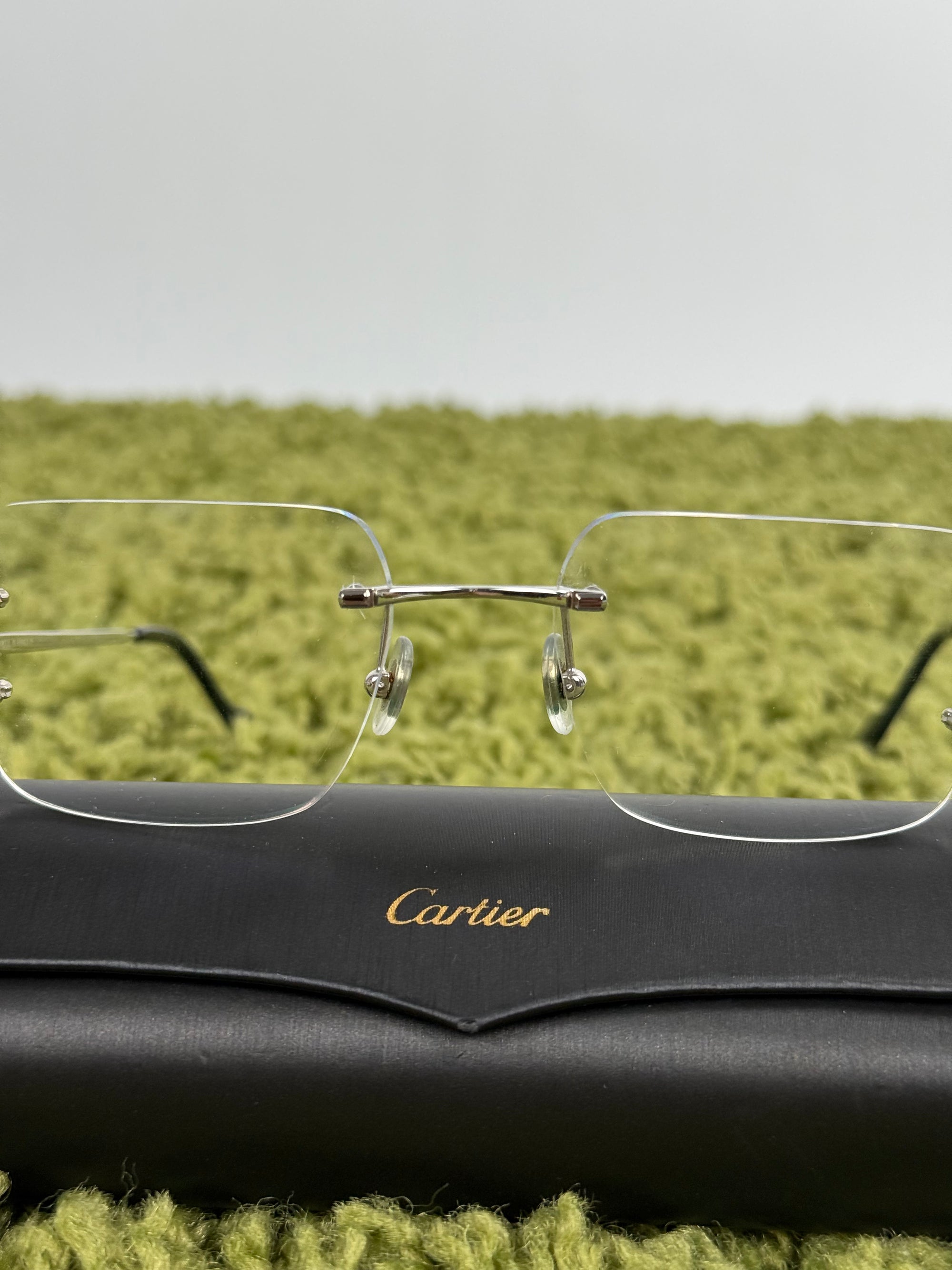 Occhiali signature C Cartier Argento
