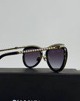 Occhiali da sole Cat-eye Chanel Nero