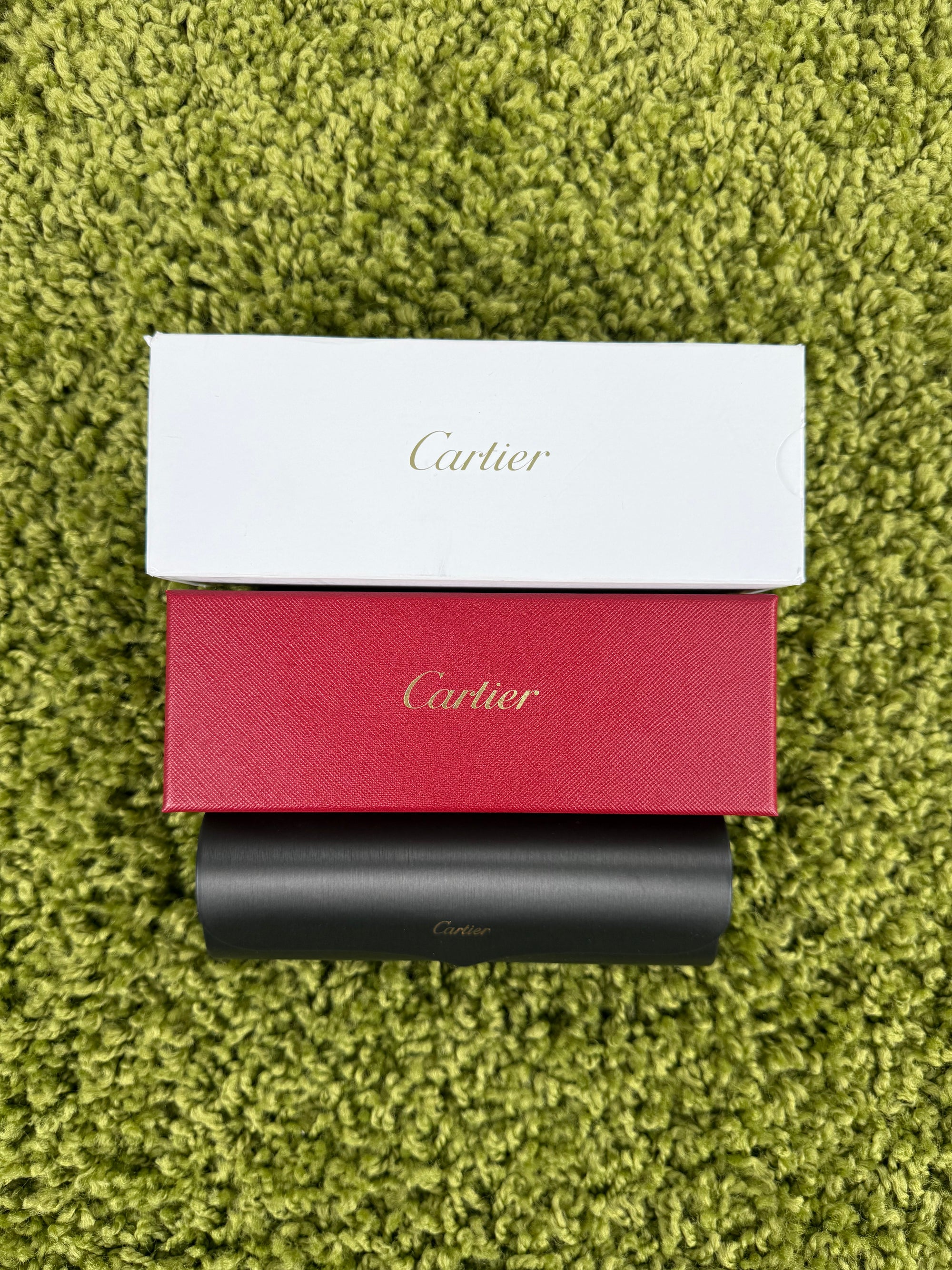 Occhiali da sole Cartier Signature C in metallo dorato con aste in legno