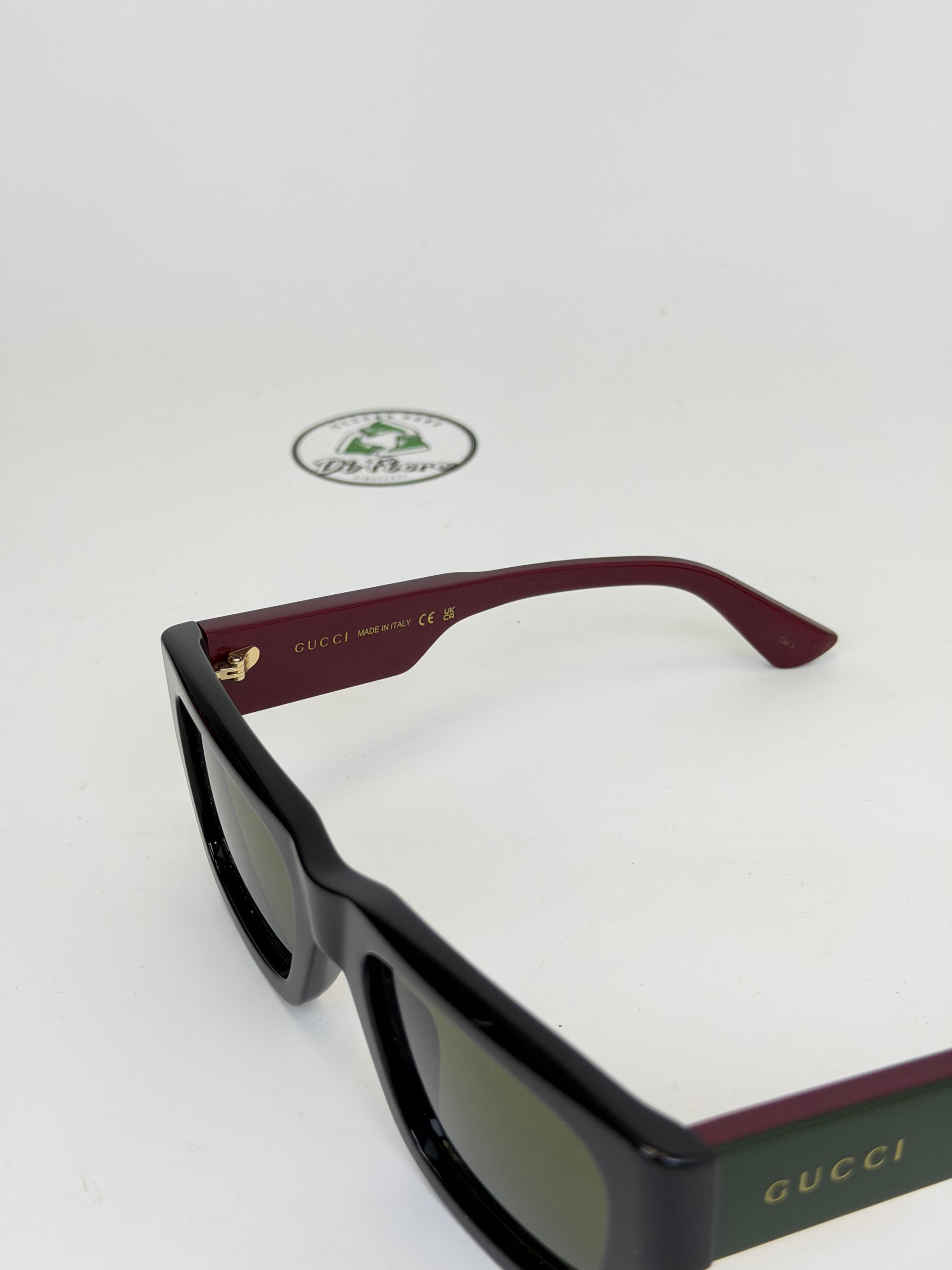 Occhiali Gucci neri rossi e verdi