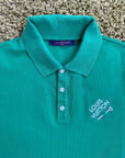Polo Louis Vuitton Verde con spilla M