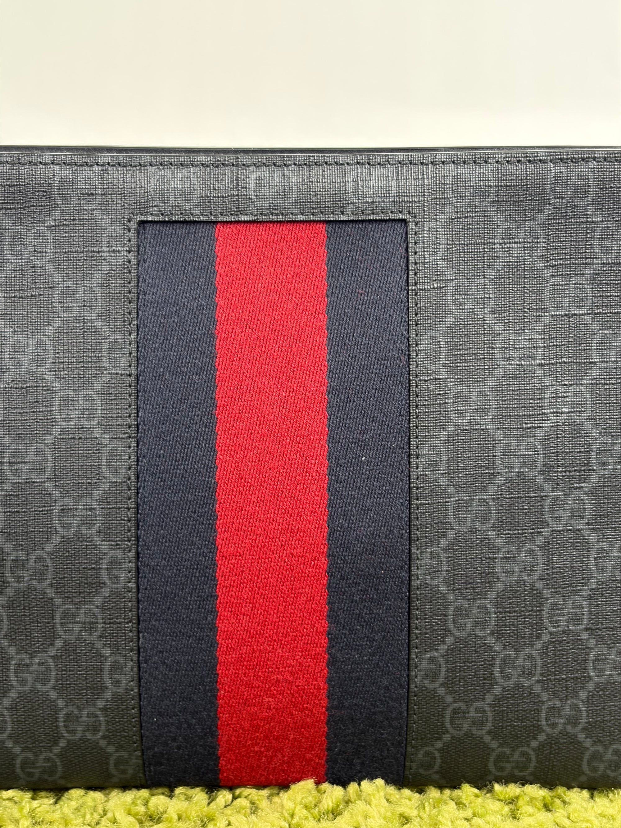 Pochette Gucci nera blu e rossa