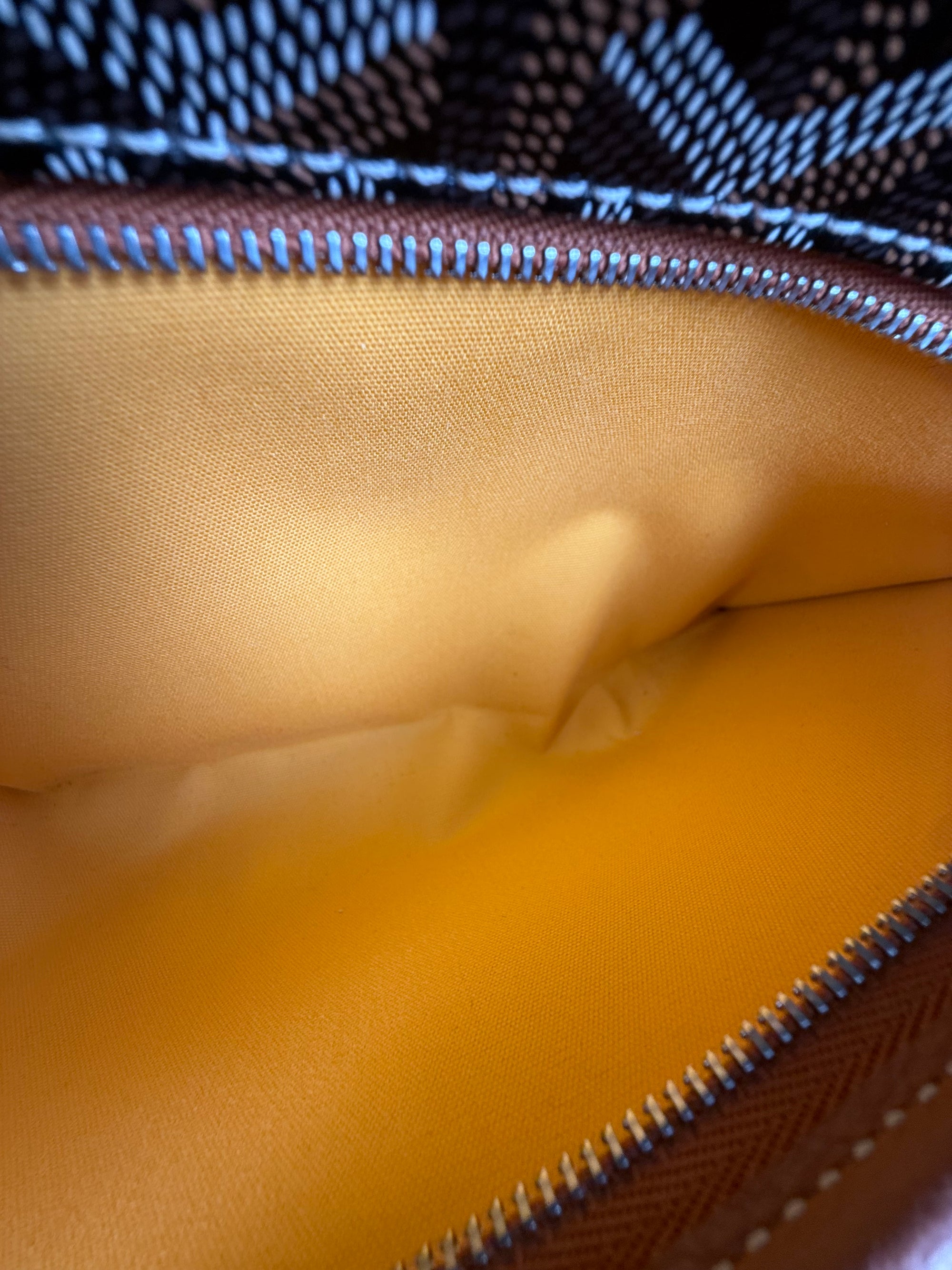 Pochette Goyard Jouvence in tela Goyardine nera con profili marroni