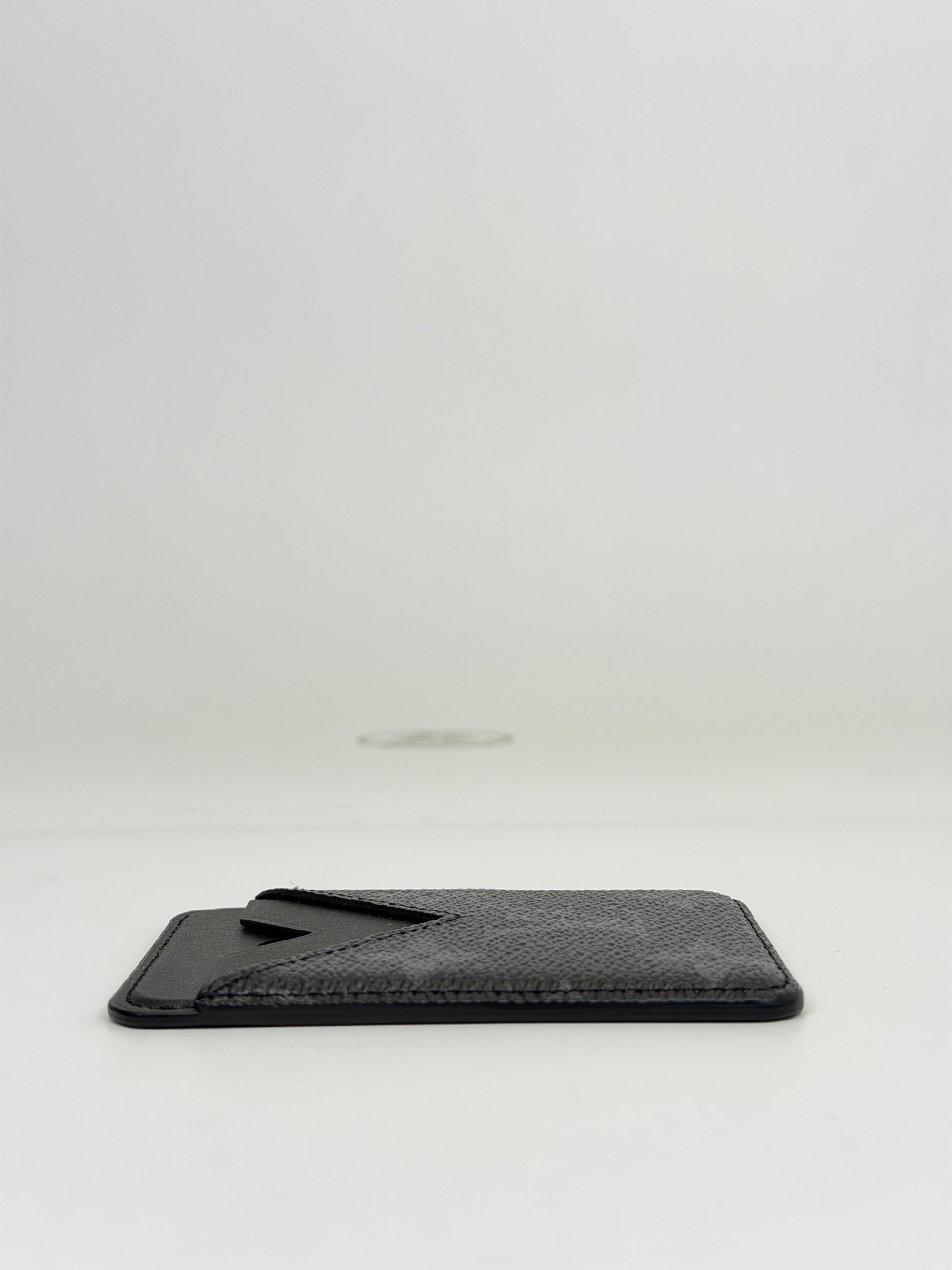 Portacarte magnetico Eclipse nero e grigio