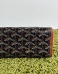 Pochette Goyard Jouvence in tela Goyardine nera con profili marroni