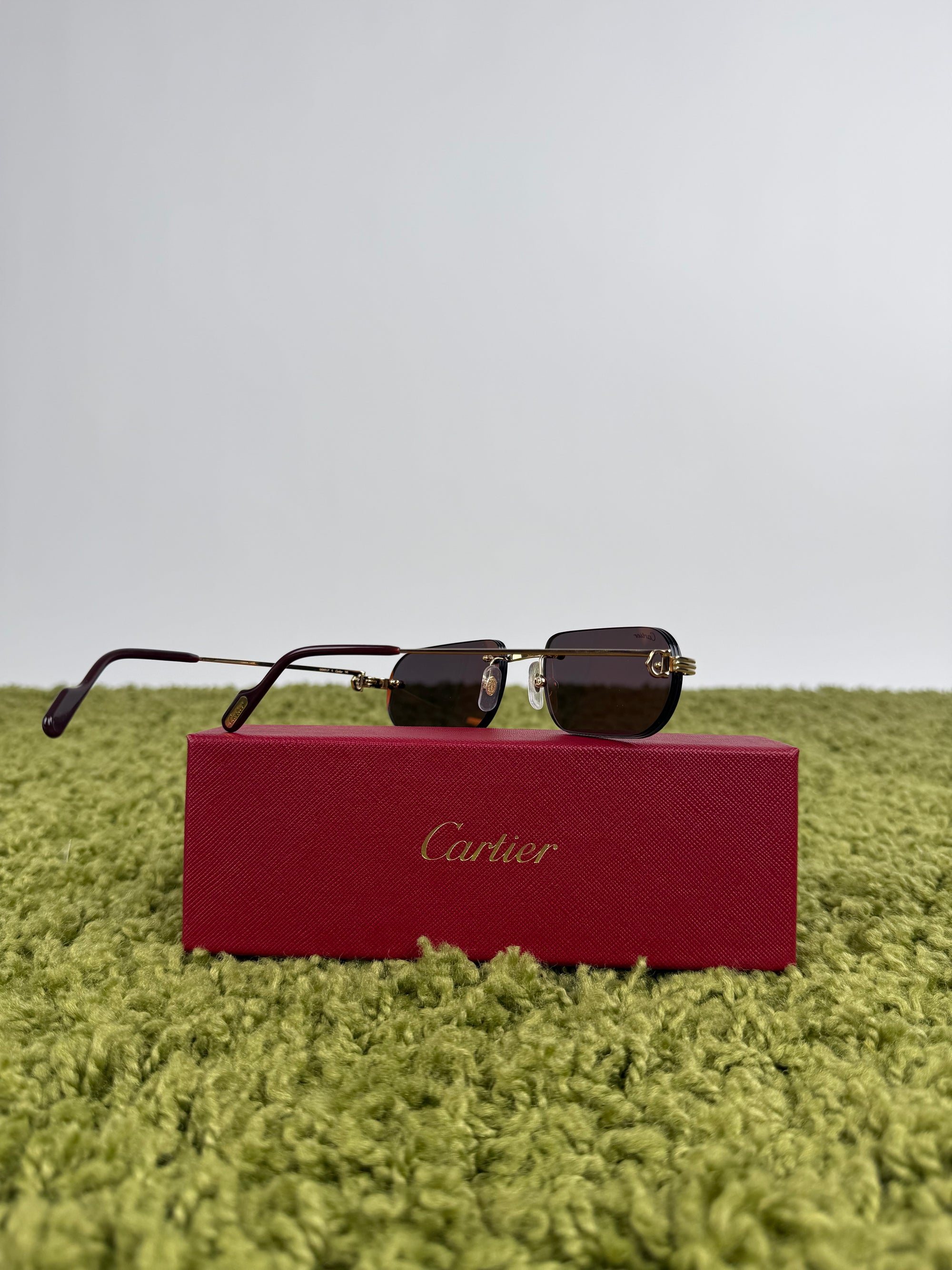Occhiali da sole Cartier Decor C Classique nero con asta oro