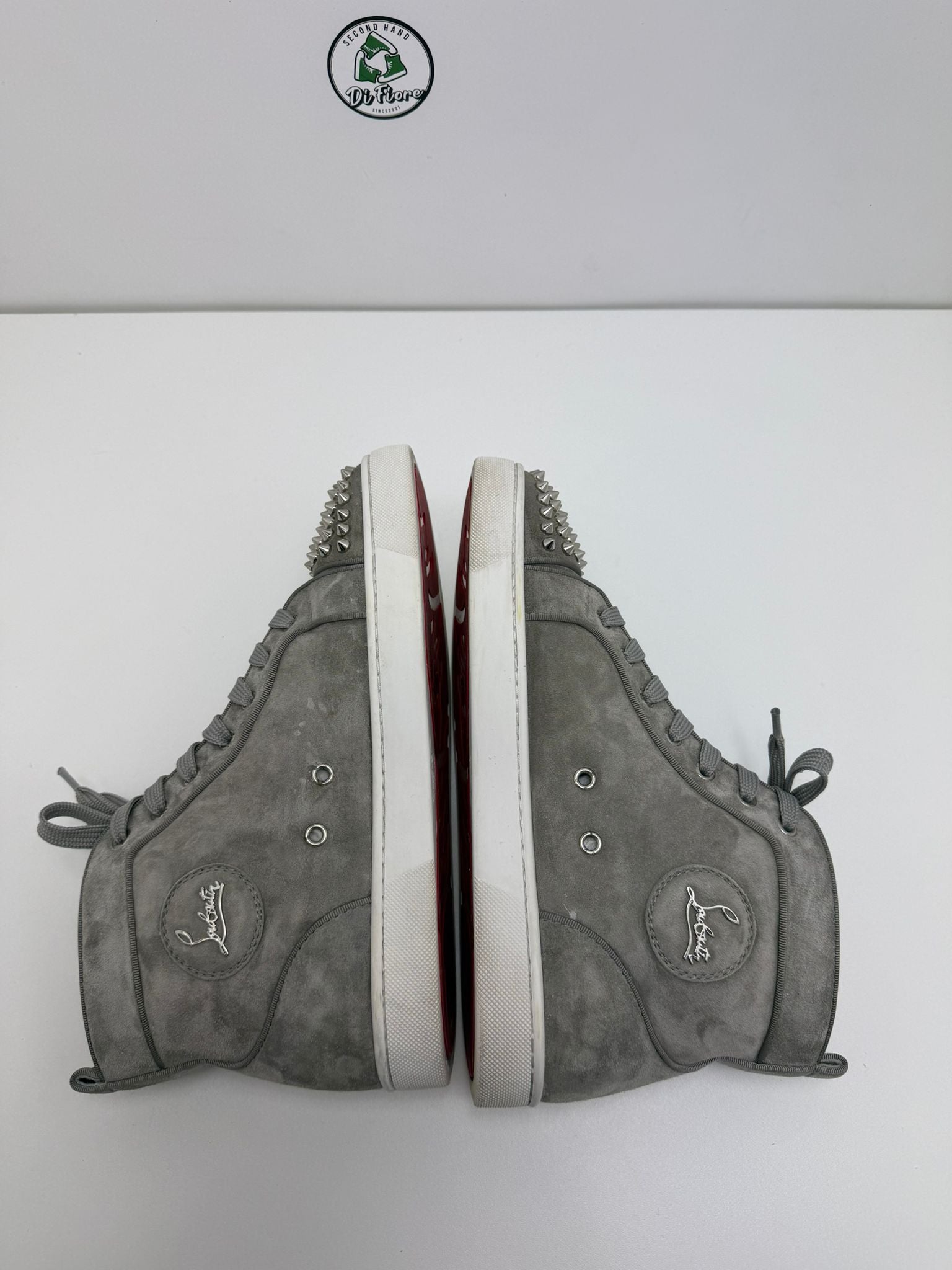 Christian Louboutin 40.5 grigia alta