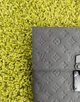 Pochette Louis Vuitton S-Lock in in pelle nera Monogram