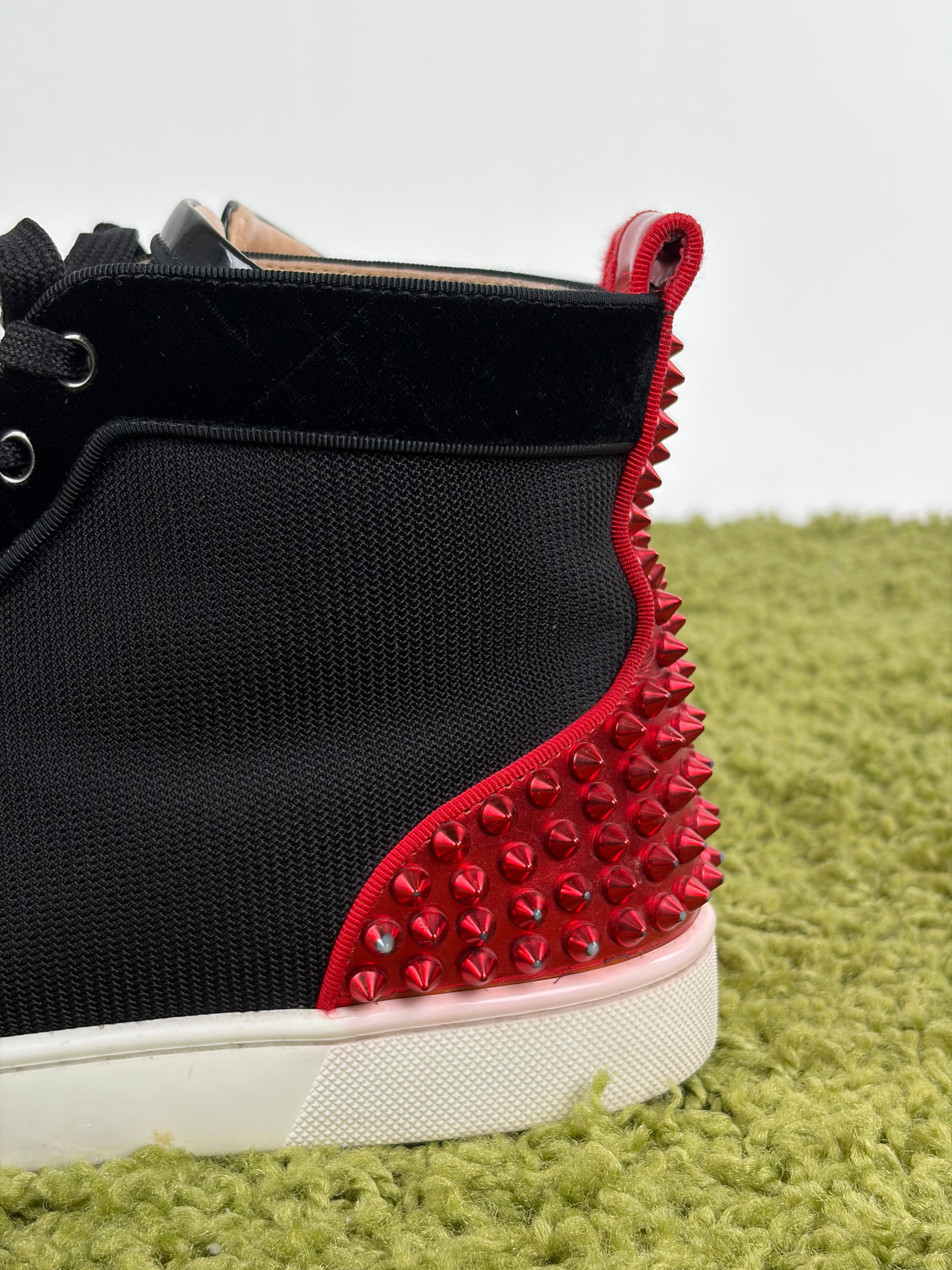 Louboutin alte Size 41 nere e risse