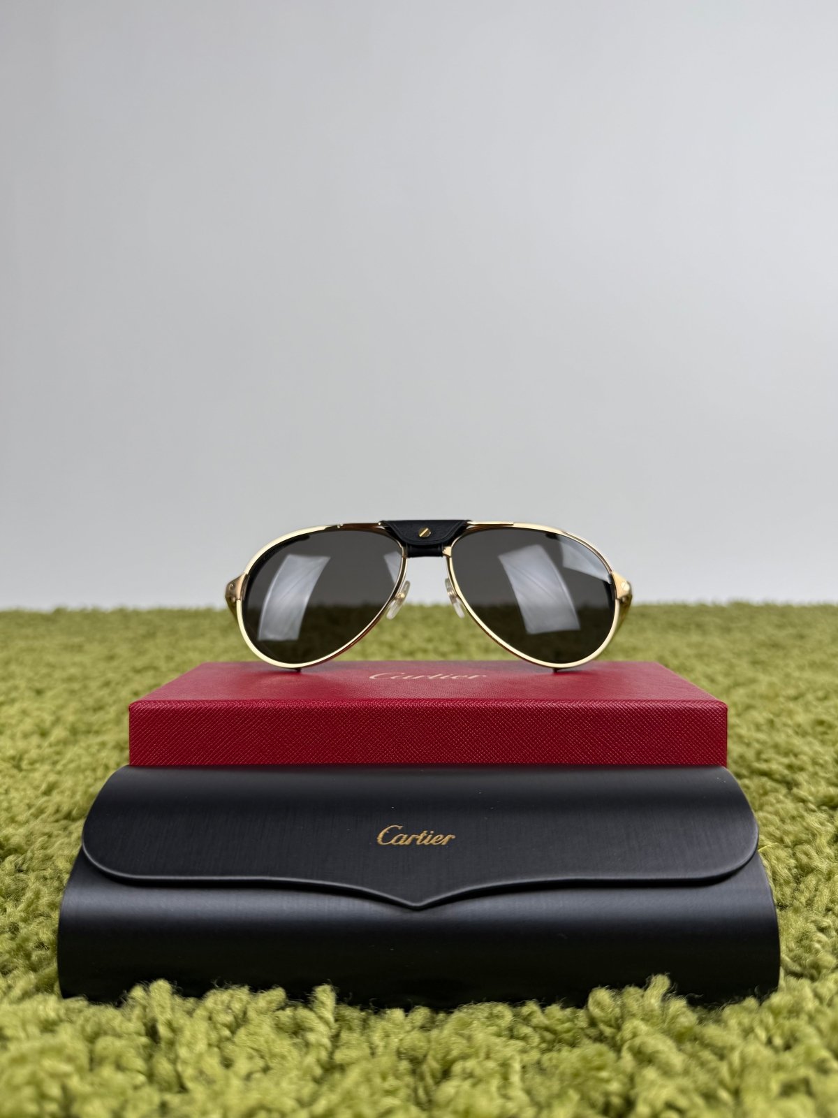 Occhiali da sole Cartier CT0296S Con montatura pilot in metallo e aste oro - Second Hand Di Fiore