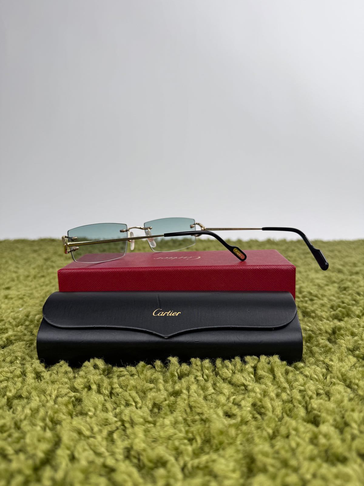 Occhiali da sole Cartier con aste oro