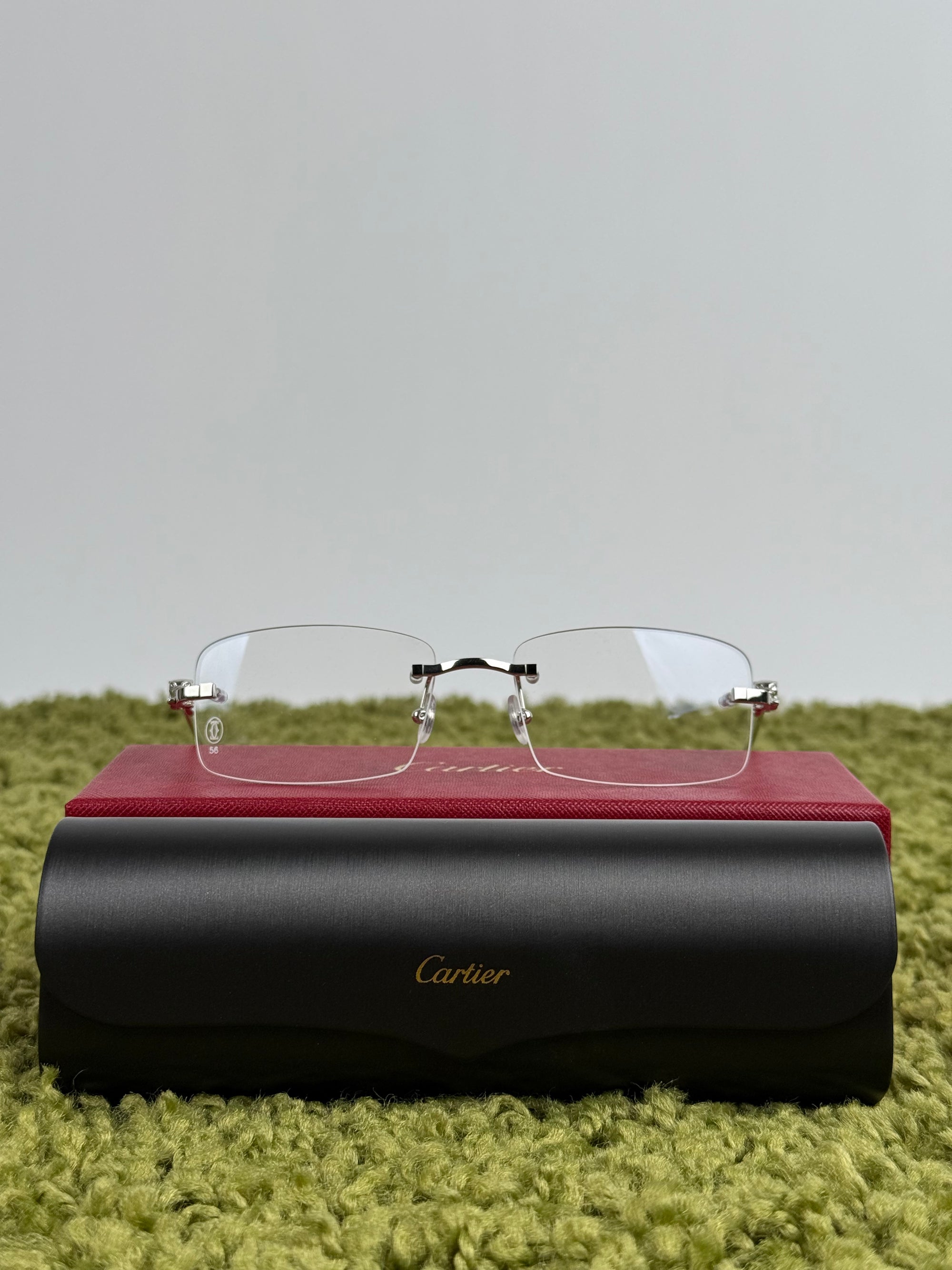 Occhiali Cartier CT0281O con dettagli pantera sulle aste argento