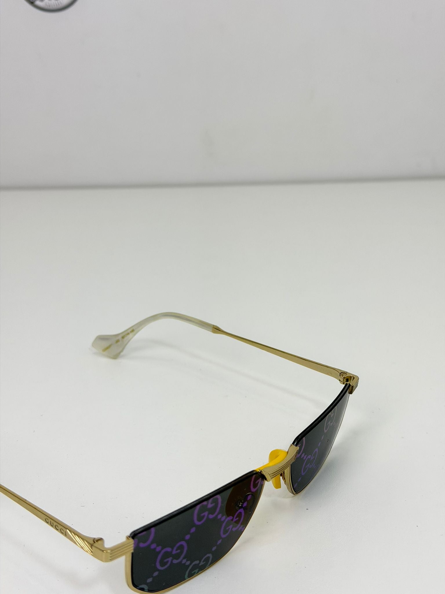 occhiali Gucci oro e multicolore