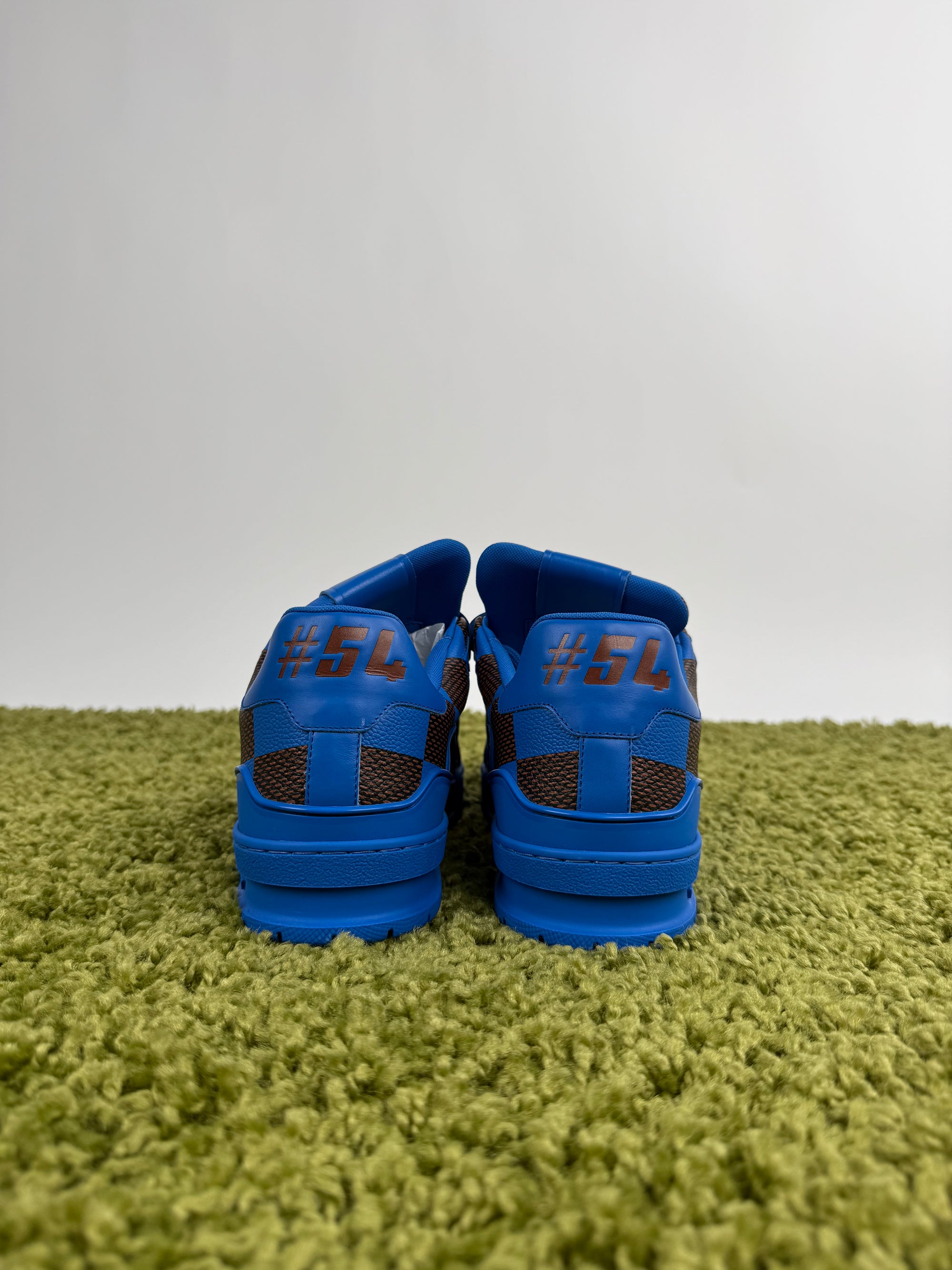 Louis Vuitton Trainer 41 veste 42