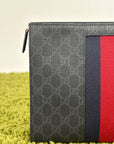 Pochette Gucci nera blu e rossa
