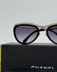 Occhiali da sole Cat-eye Chanel Nero
