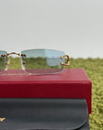 Occhiali da sole Cartier con aste oro