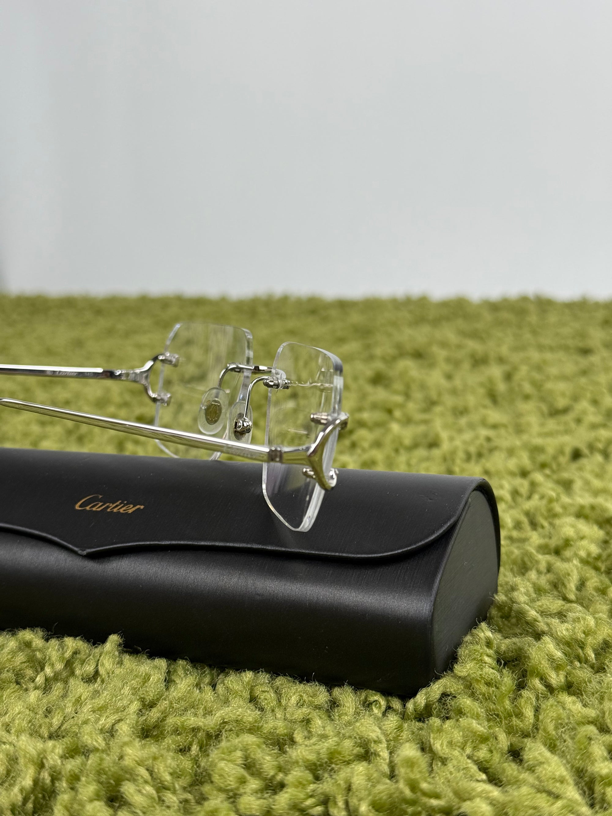 Occhiali signature C Cartier Argento