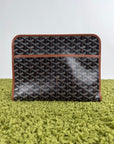 Pochette Goyard Jouvence in tela Goyardine nera con profili marroni