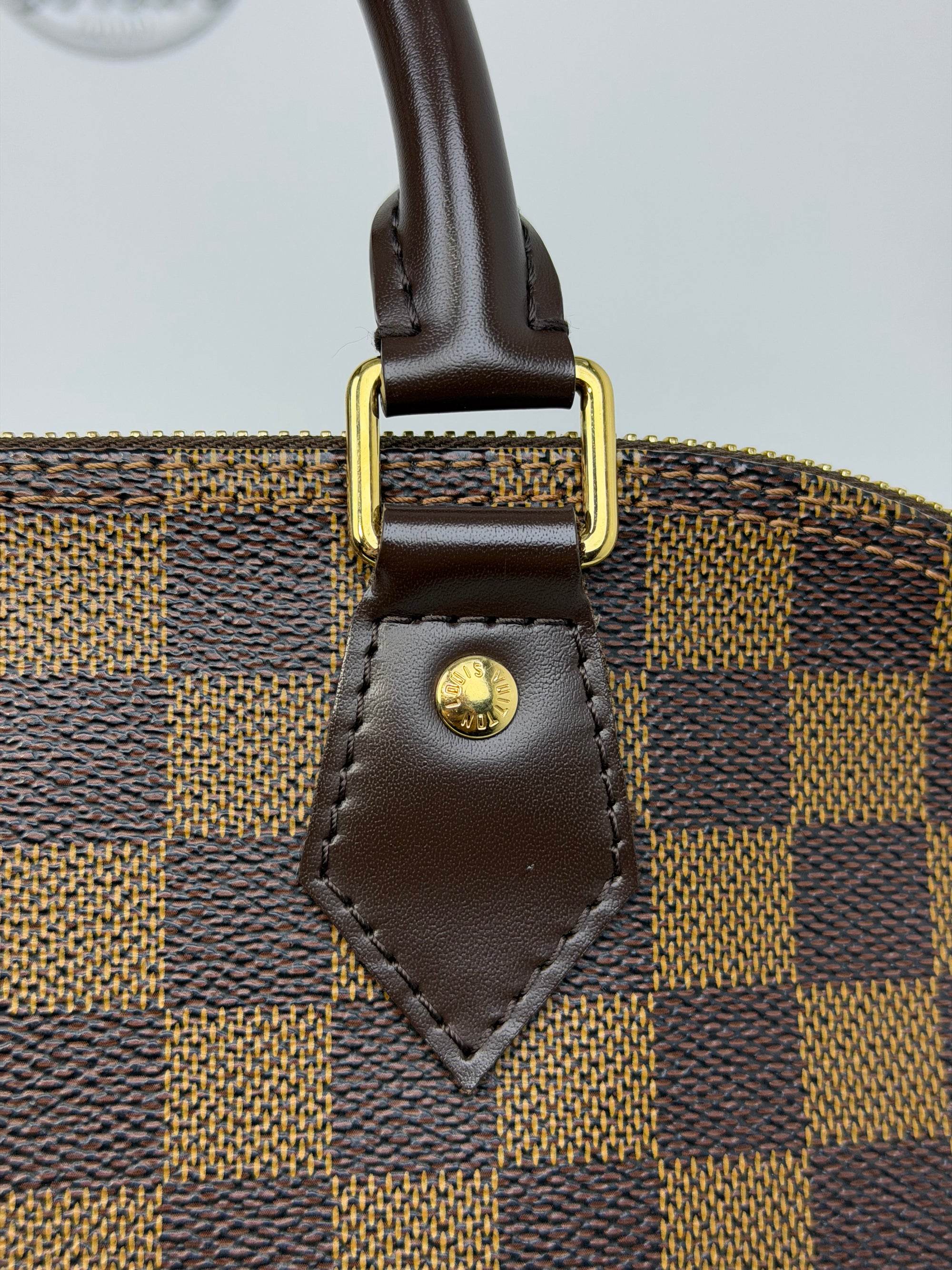 Borsa Louis Vuitton Alma PM marrone