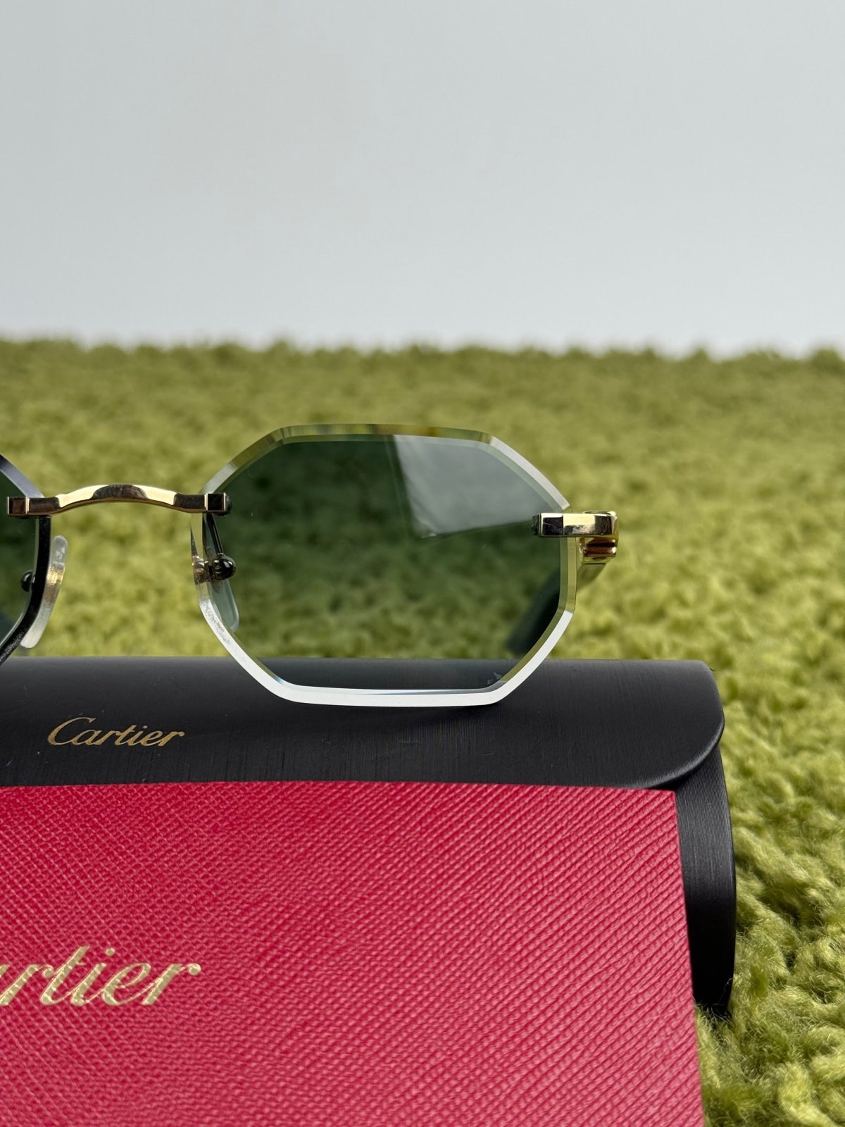 Occhiali da sole Cartier Decor C Allongè con montatura a giorno Verdi - Second Hand Di Fiore